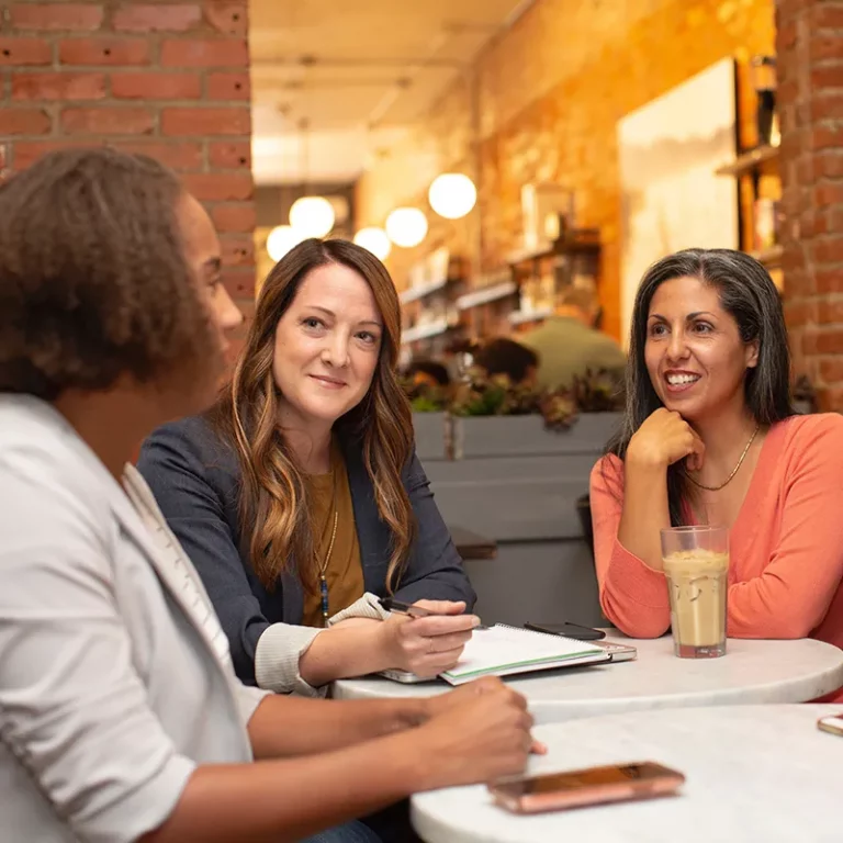 A group of women engaged in a workplace menopause support session