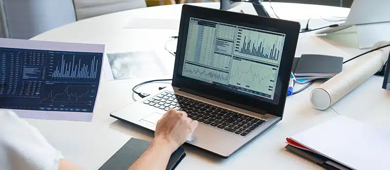 Is health screening a legal requirement for workplace - an HR worker goes through employee data following a health screening