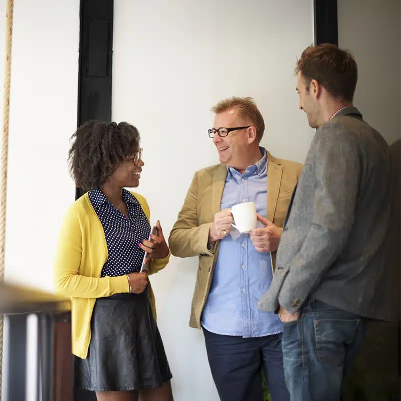 A group of managers discussing mental health