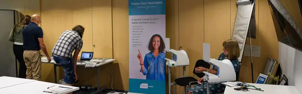 A group of employees engaging in a workplace health MOT